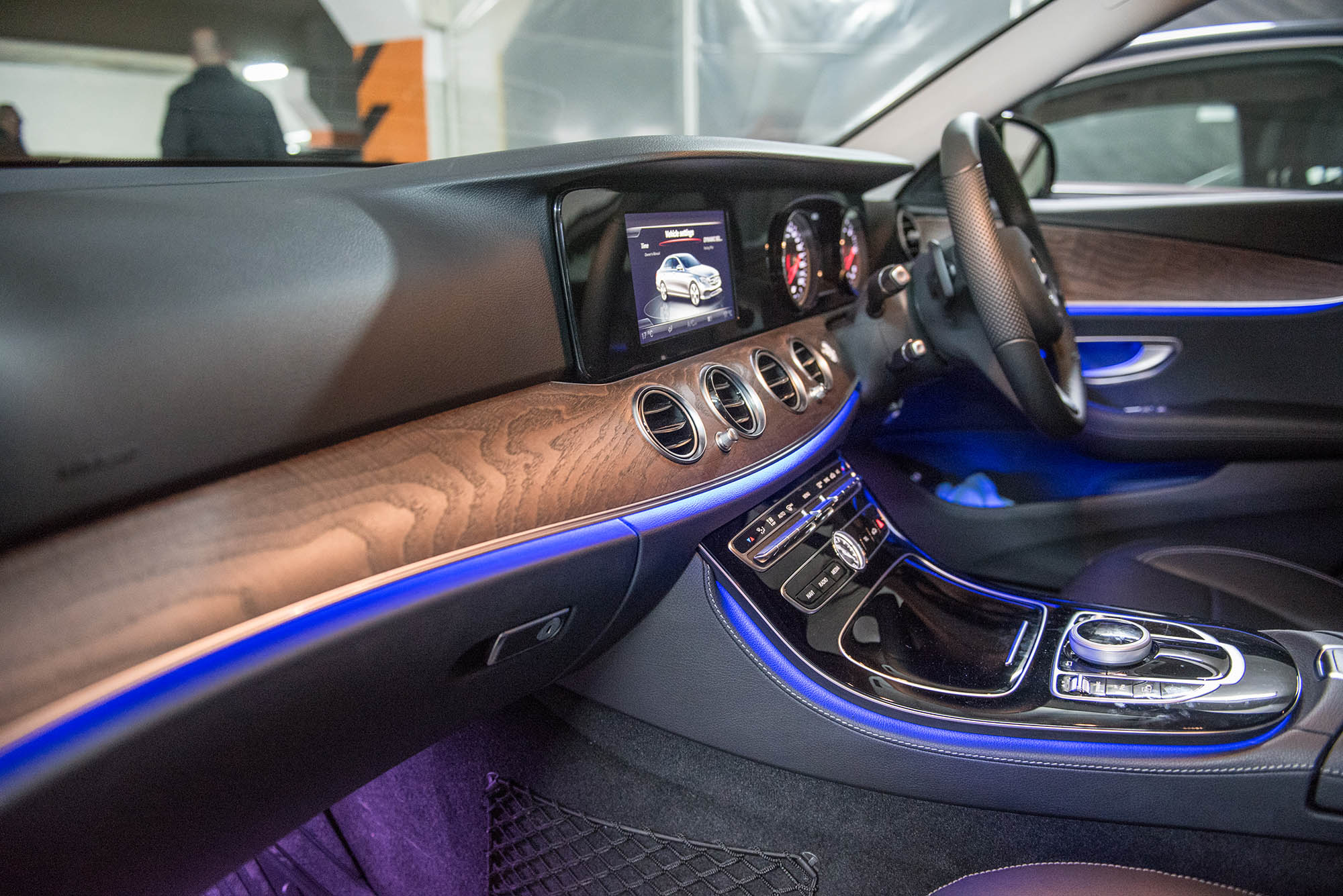 Rear cabin of a Mercedes E-Class with ambient lighting